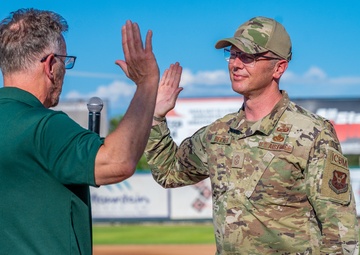 Malmstrom command chief throws Voyagers game first pitch