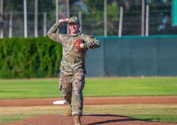 Malmstrom command chief throws Voyagers game first pitch