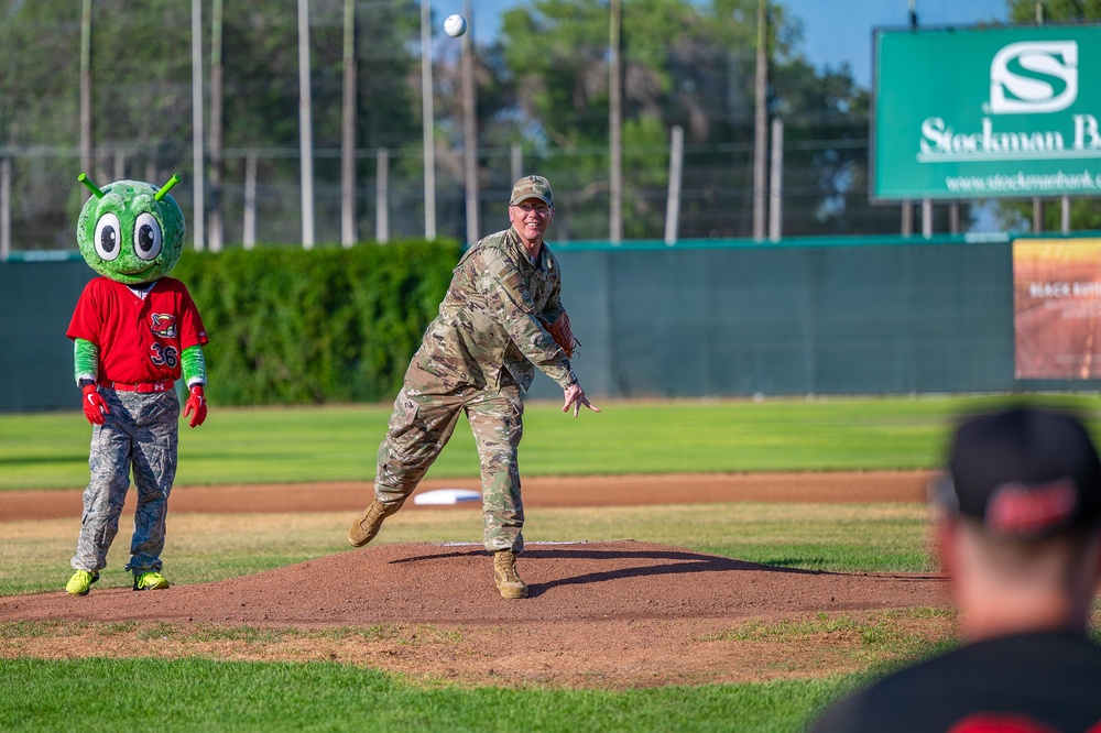 Malmstrom command chief throws Voyagers game first pitch