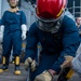 USS Ronald Reagan (CVN 76) Sailors conduct flooding response drill