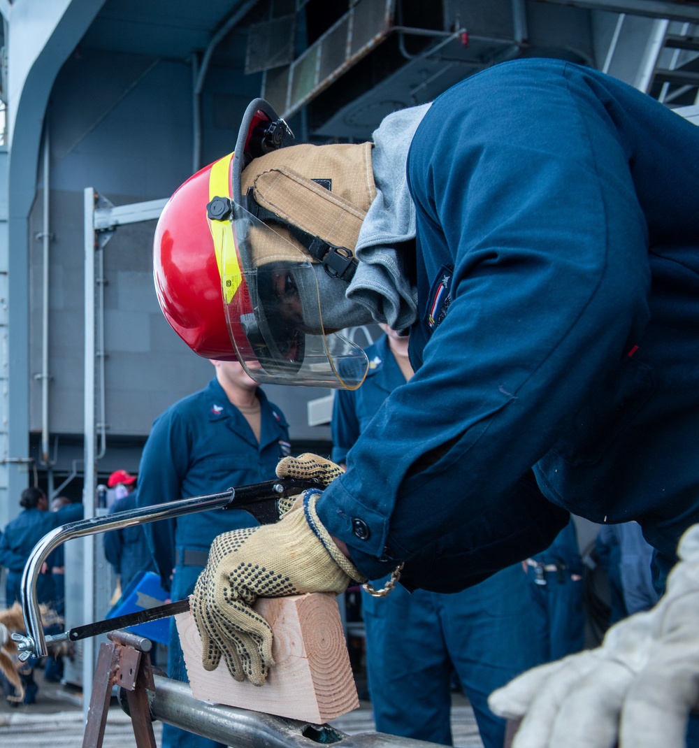 USS Ronald Reagan (CVN 76) Sailors conduct flooding response drill