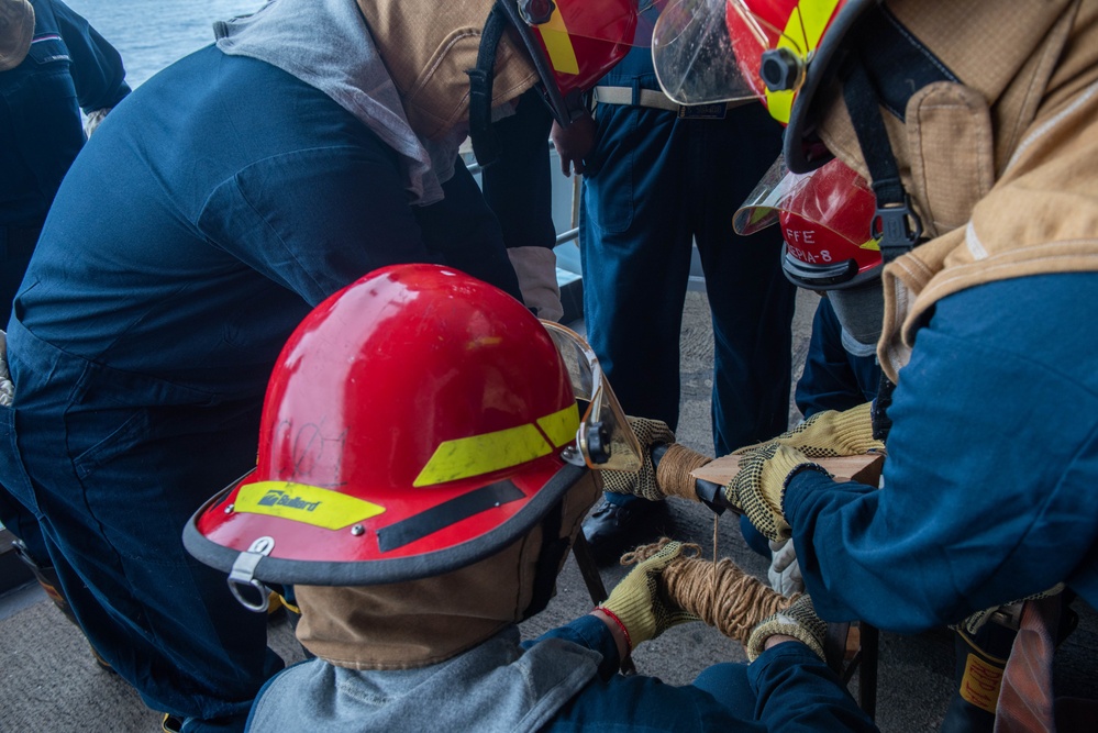 USS Ronald Reagan (CVN 76) Sailors conduct flooding response drill