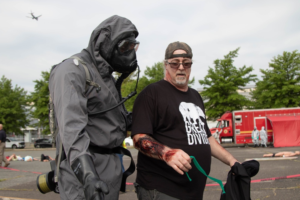 A US Soldier conducts decontamination operations in Philadelphia