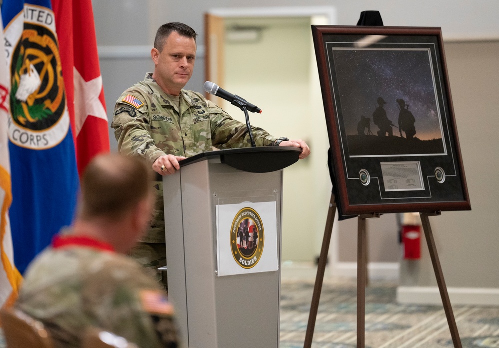 Brig. Gen. Christopher Schneider addresses Col. Douglas Copeland During SMPT Relinquishment of Charter Ceremony