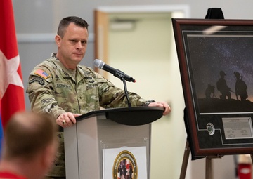 Brig. Gen. Christopher Schneider addresses Col. Douglas Copeland During SMPT Relinquishment of Charter Ceremony