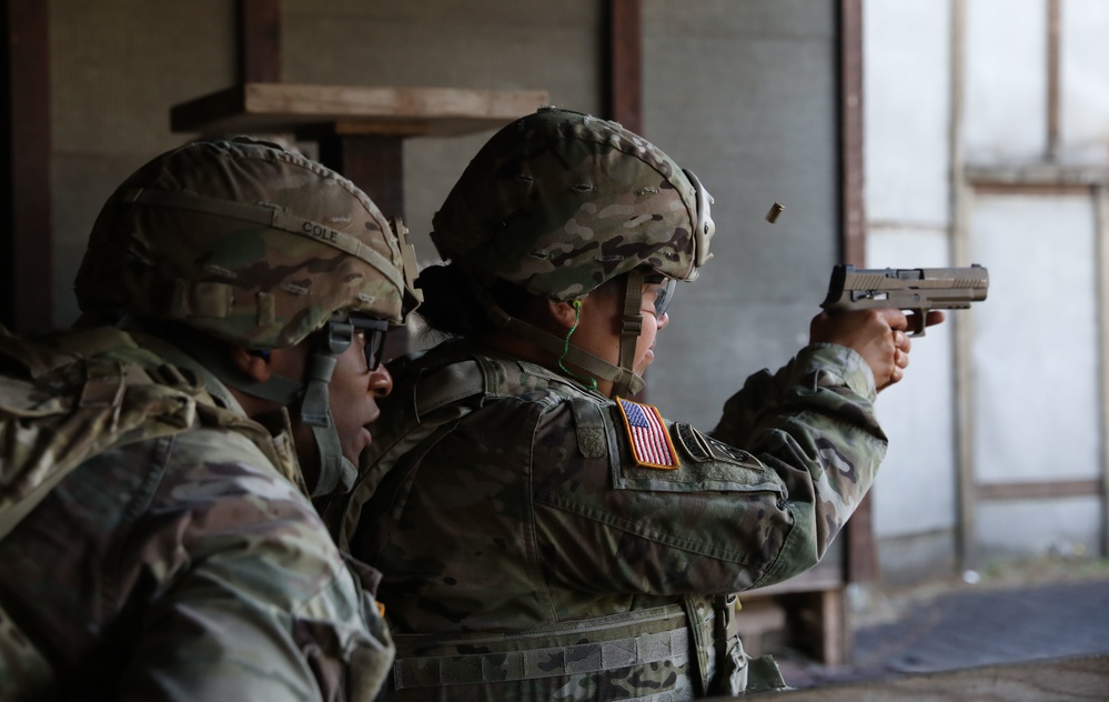 Cpt. Vanessa N. Misola qualifies on the range with the M17 pistol