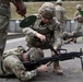 Soldiers from the 21st Theater Sustainment Command clear an M249 on range