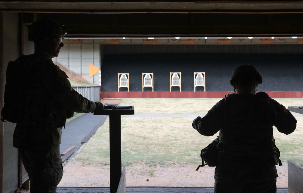 Col. Grant T. Thimsen and Capt. Vanessa N. Misola wait for clearance on range