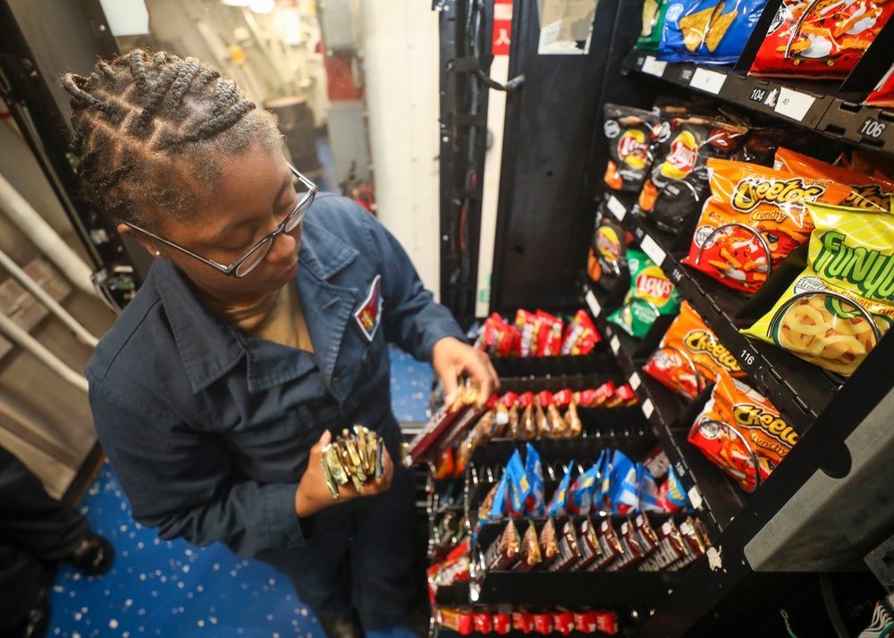 Retail Specialist Stocks Vending Machine