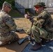 Staff Sgt. Devin Crawford receives tips from a German Reserve Soldier