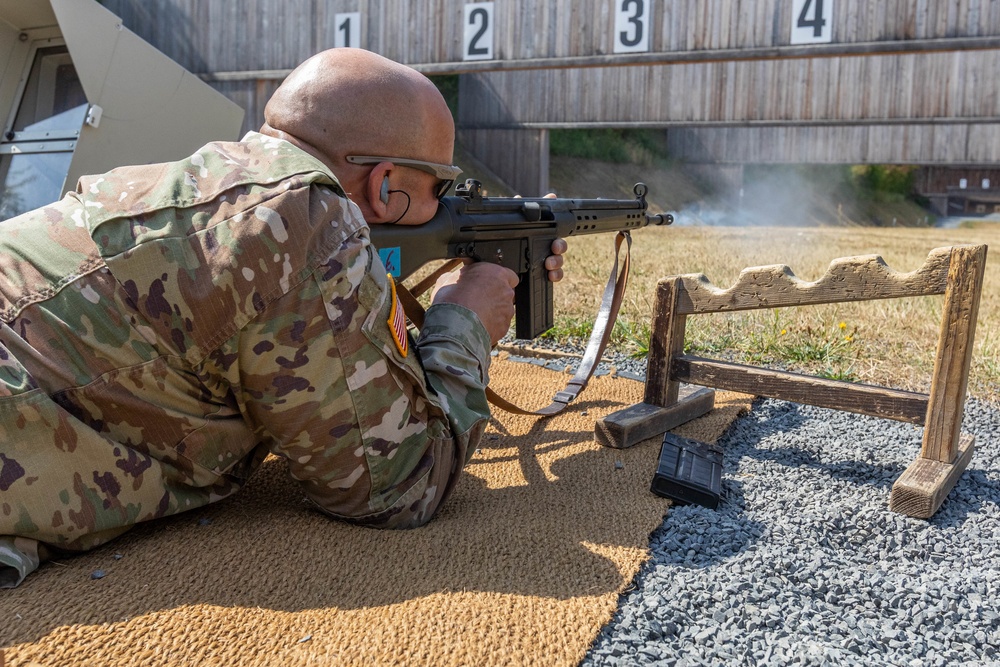 Capt. Thomas Wheeler fires a G3 rifle