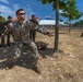 Maj. Sterling Broadhead throws a practice grenade