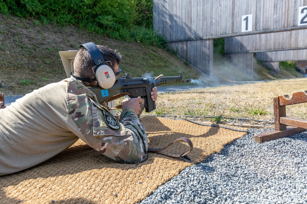 Maj. Sterling Broadhead fires a G3 rifle