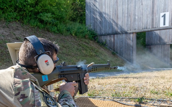 Maj. Sterling Broadhead fires a G3 rifle