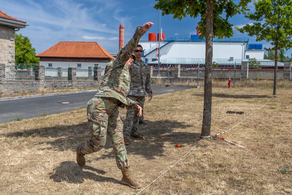 2nd Lt. Katy Voss throws a practice grenade