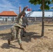 2nd Lt. Katy Voss throws a practice grenade