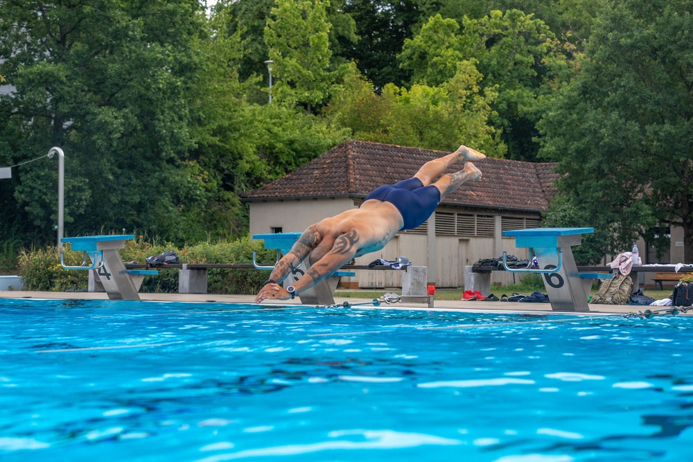 Staff Sgt. Devin Crawford dives