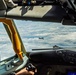 KC-135 pilot flies in formation with another KC-135