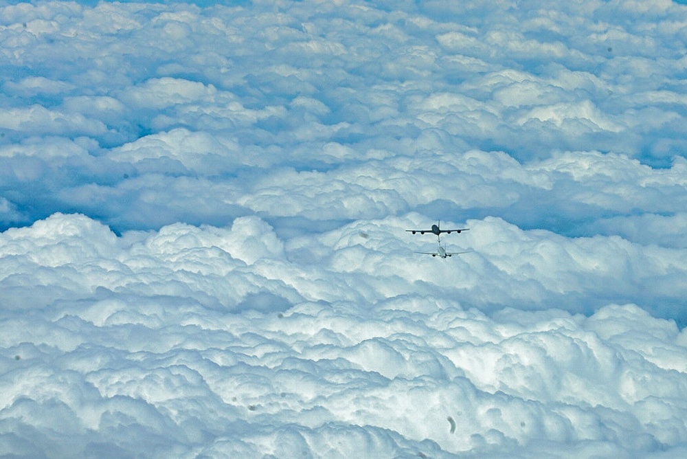 KC-135 Stratotanker refuels P-8