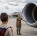 Crew chief teaches Civil Air Patrol cadets about the engine of the KC-135