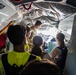 Pilot shows Civil Air Patrol cadets the cockpit of a KC-135