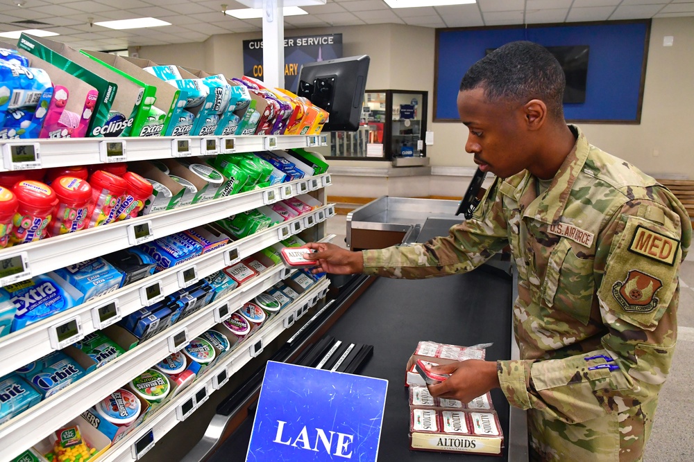 Airmen volunteers restock Commissary shelves