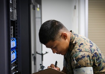 Pfc. Erwin C. Mariano Inventories Equipment