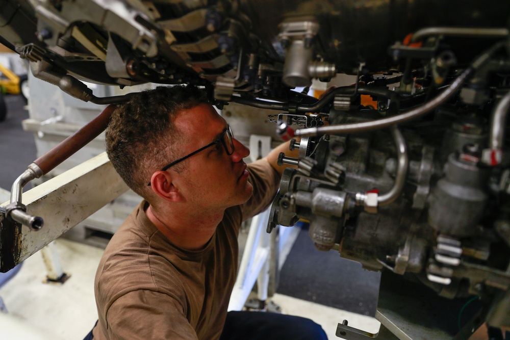 Abraham Lincoln Sailor conducts maintenance