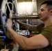 Abraham Lincoln Sailor conducts maintenance