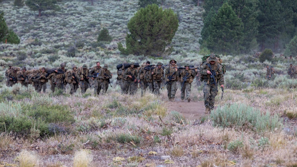 The Final Descent | U.S. Marines with 1st Battalion, 24th Marine Regiment finish Mountain Training Exercise 4-22 with a hike down the mountains at Mountain Warfare Training Center