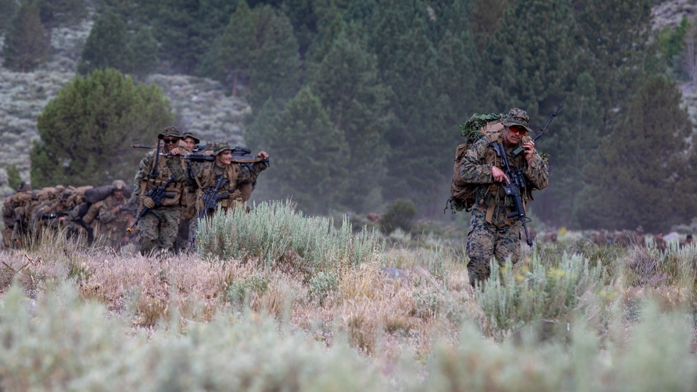 The Final Descent | U.S. Marines with 1st Battalion, 24th Marine Regiment finish Mountain Training Exercise 4-22 with a hike down the mountains at Mountain Warfare Training Center