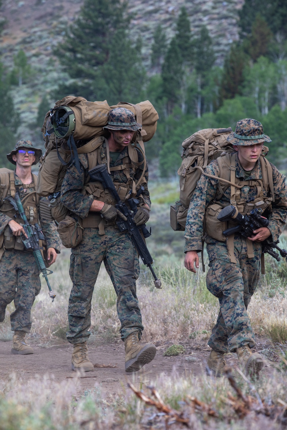 The Final Descent | U.S. Marines with 1st Battalion, 24th Marine Regiment finish Mountain Training Exercise 4-22 with a hike down the mountains at Mountain Warfare Training Center