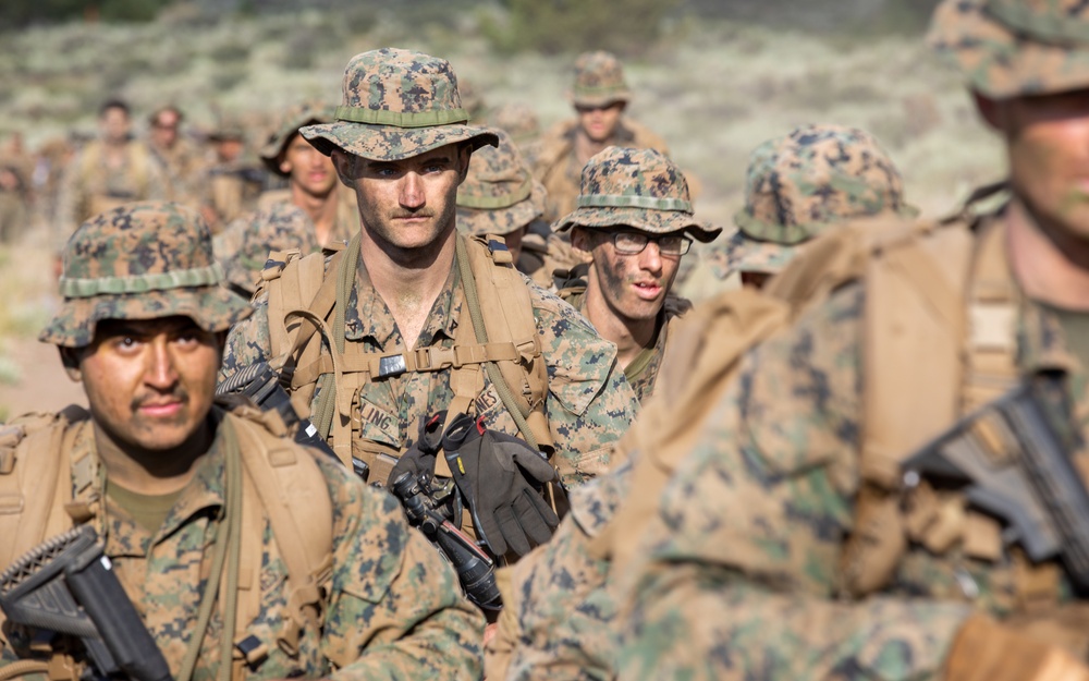 The Final Descent | U.S. Marines with 1st Battalion, 24th Marine Regiment finish Mountain Training Exercise 4-22 with a hike down the mountains at Mountain Warfare Training Center