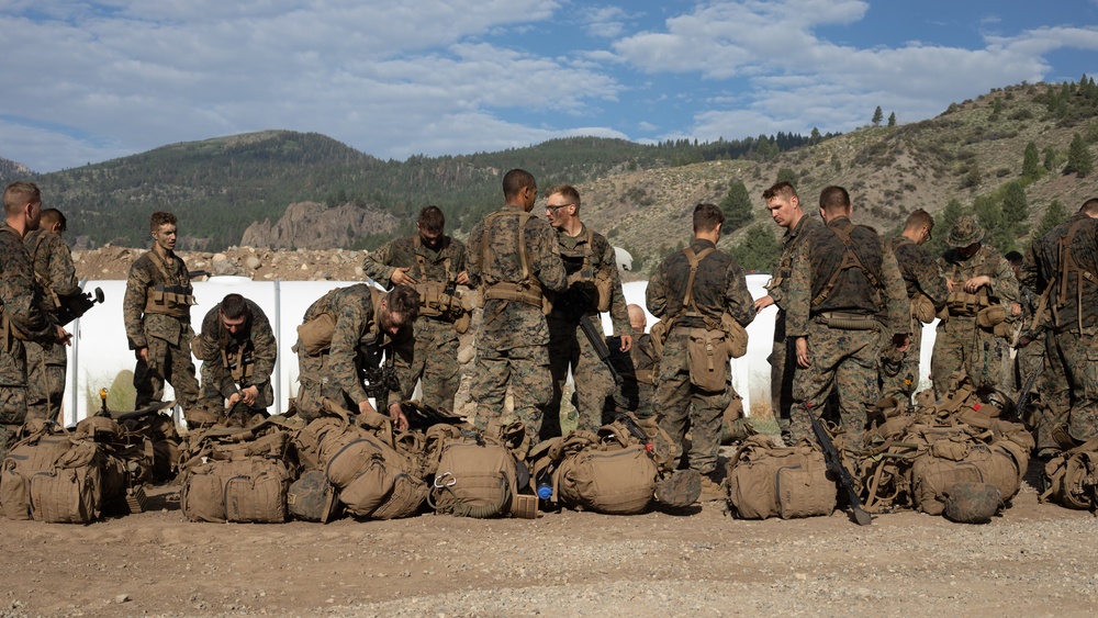 The Final Descent | U.S. Marines with 1st Battalion, 24th Marine Regiment finish Mountain Training Exercise 4-22 with a hike down the mountains at Mountain Warfare Training Center