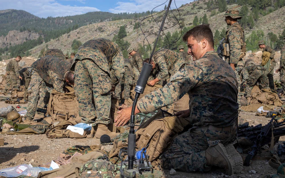 The Final Descent | U.S. Marines with 1st Battalion, 24th Marine Regiment finish Mountain Training Exercise 4-22 with a hike down the mountains at Mountain Warfare Training Center
