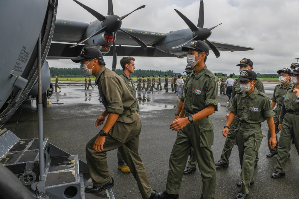 Air Cadets from the National Defense Academy of Japan tour aircraft assigned to the 36th and 459th Airlift Squadrons