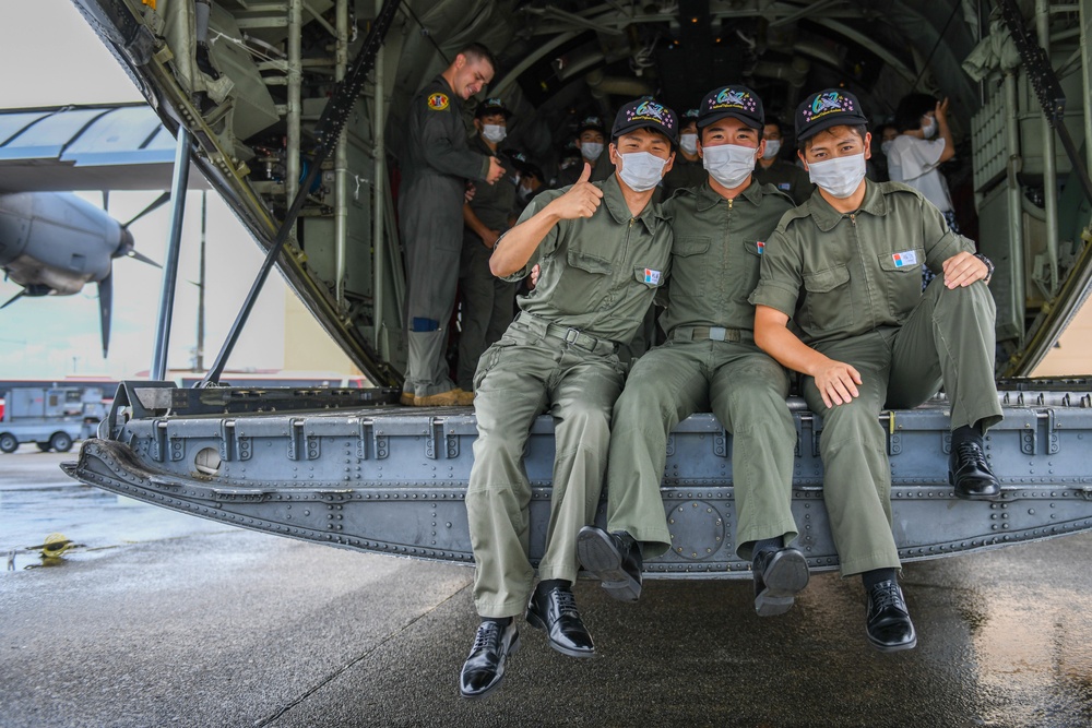 Air Cadets from the National Defense Academy of Japan tour aircraft assigned to the 36th and 459th Airlift Squadrons