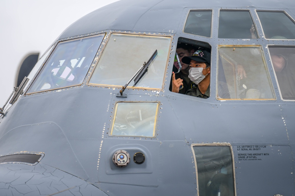 Air Cadets from the National Defense Academy of Japan tour aircraft assigned to the 36th and 459th Airlift Squadrons