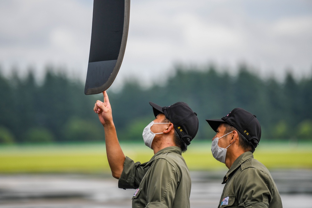 Air Cadets from the National Defense Academy of Japan tour aircraft assigned to the 36th and 459th Airlift Squadrons