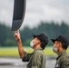 Air Cadets from the National Defense Academy of Japan tour aircraft assigned to the 36th and 459th Airlift Squadrons