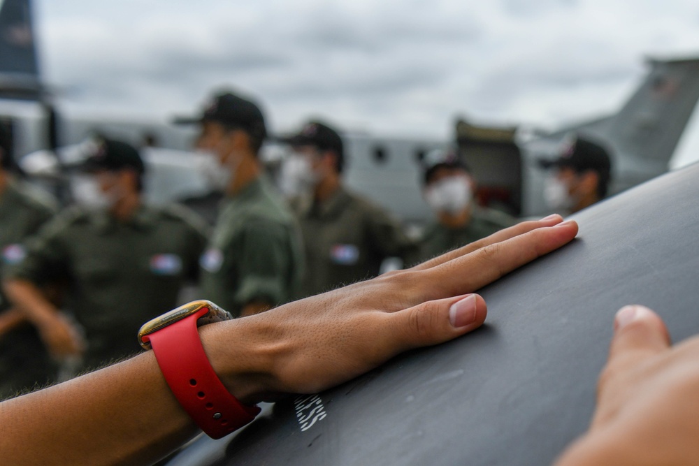 Air Cadets from the National Defense Academy of Japan tour aircraft assigned to the 36th and 459th Airlift Squadrons