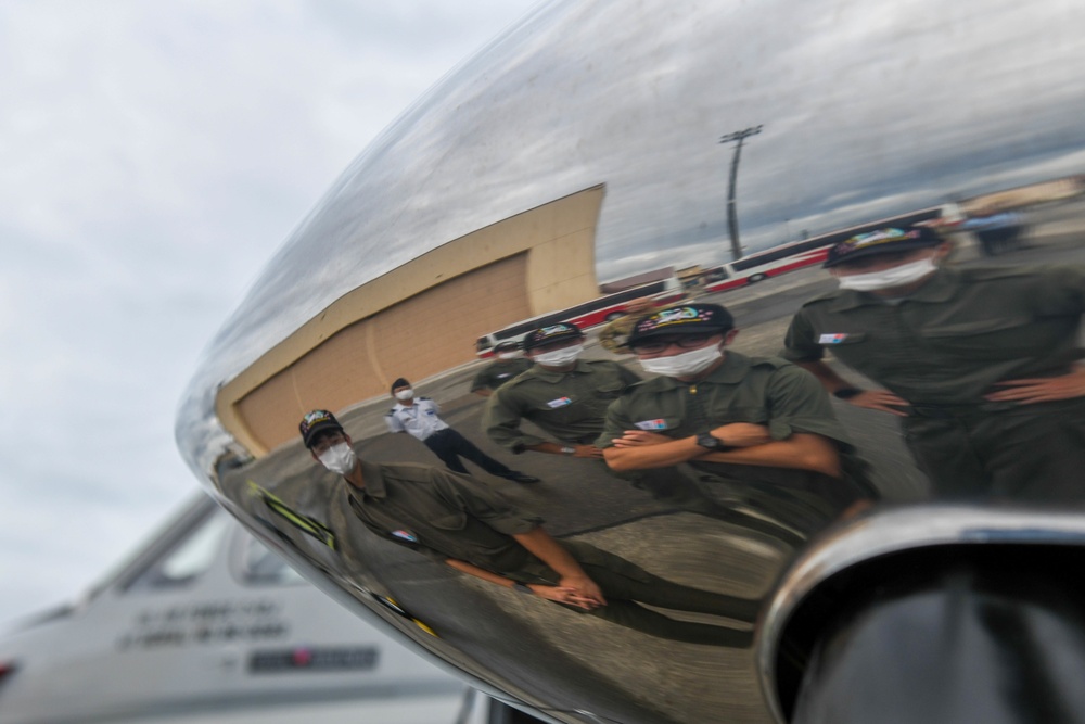 Air Cadets from the National Defense Academy of Japan tour aircraft assigned to the 36th and 459th Airlift Squadrons