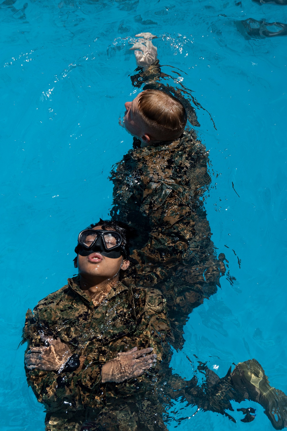 Marines complete one of the most difficult swim qualifications the Marine Corps offers