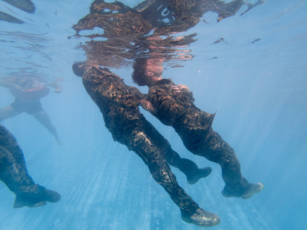 Marines complete one of the most difficult swim qualifications the Marine Corps offers