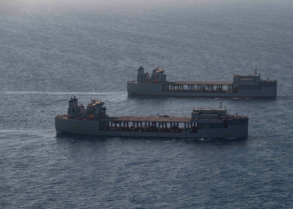 USS Hershel “Woody” Williams and USS Lewis B. Puller sail side-by-side