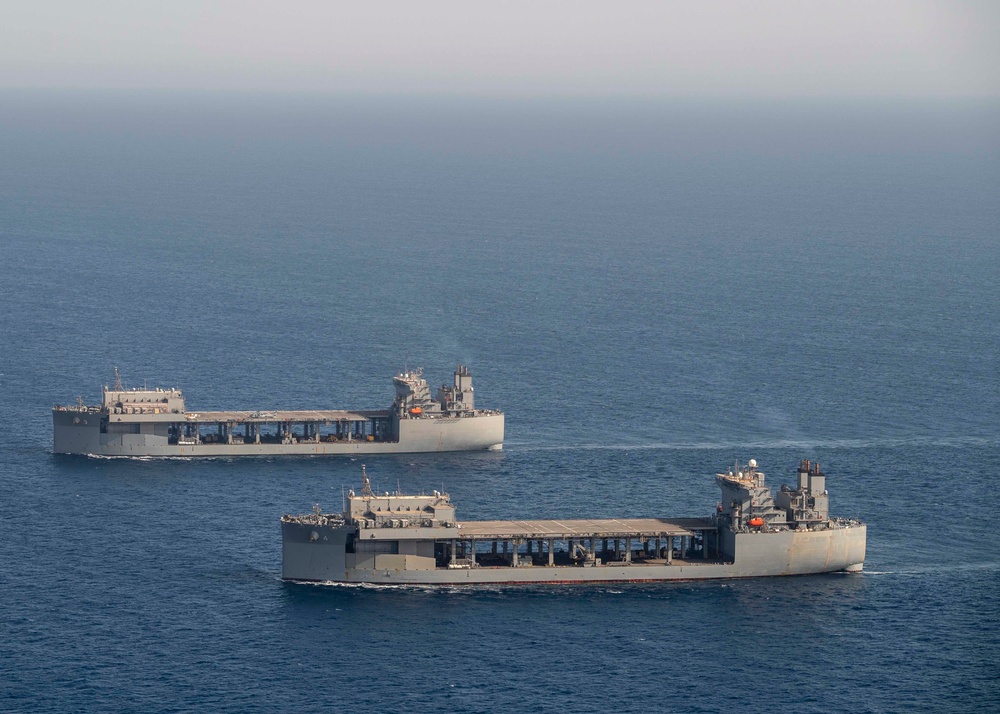 USS Hershel “Woody” Williams and USS Lewis B. Puller sail side-by-side