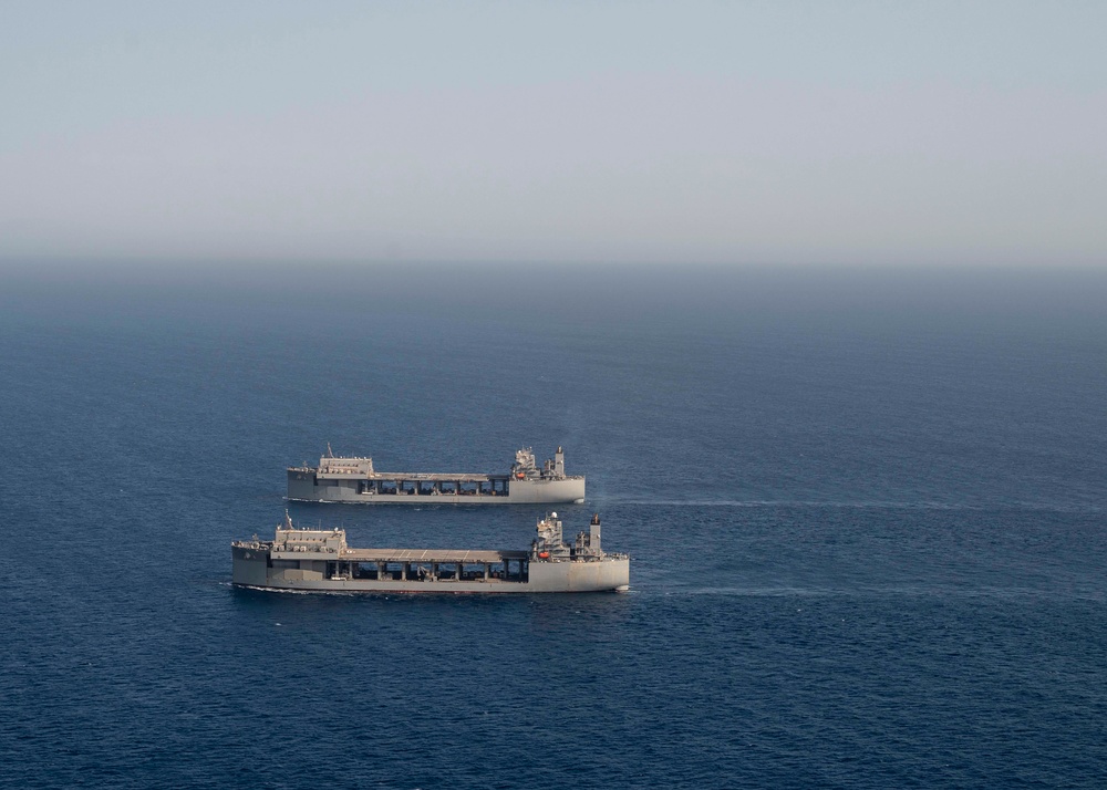 USS Hershel “Woody” Williams and USS Lewis B. Puller sail side-by-side