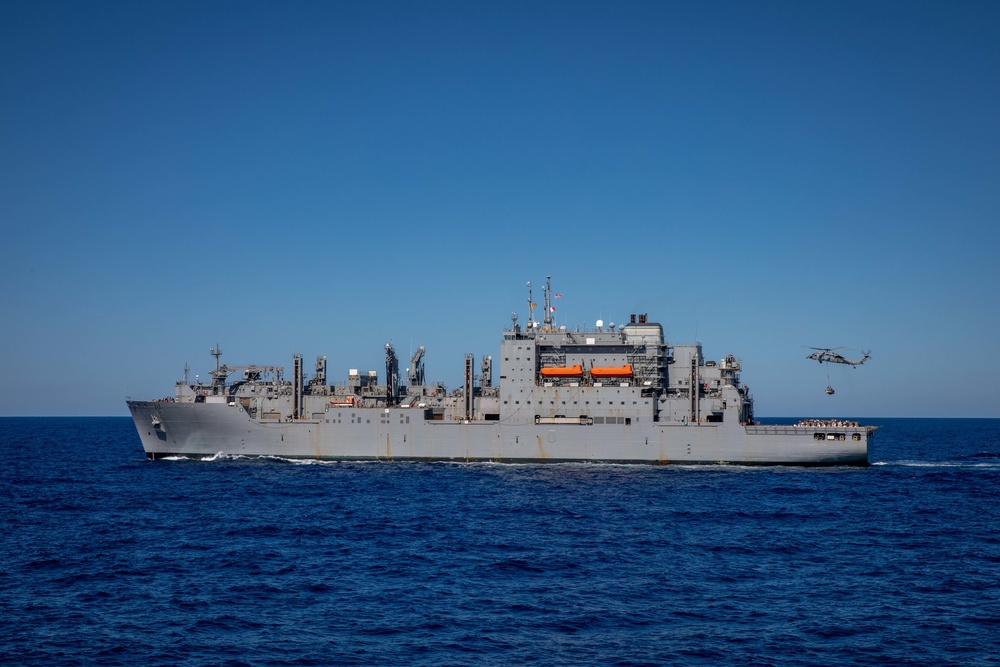 USNS William McLean replenishes USS Arlington via VERTREP