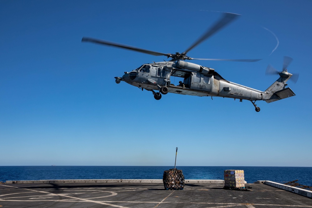 USNS William McLean replenishes USS Arlington via VERTREP