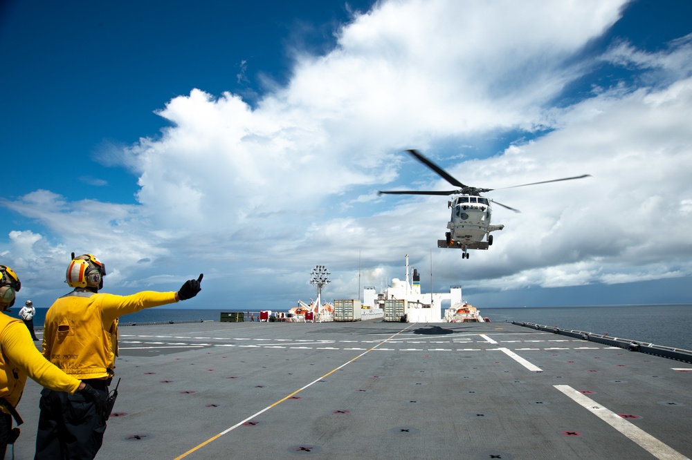 USNS Mercy (T-AH 19) Conducts an Exercise with a Japanese Maritime Self Defense Force Helicopter During Pacific Partnership 2022